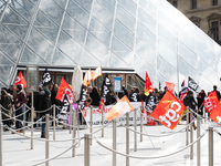Striking Employees Block The Opening Of The Louvre Museum