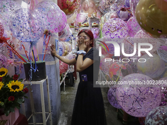A balloon vendor inside the Jamaica Market in Mexico City where dozens of people came to buy flowers and gifts for Mother's Day, which is ce...