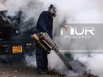 A health worker uses an anti-mosquito fumigation machine to control mosquitoes in Colombo, Sri Lanka. May 10, 2023. The dangerous dengue vir...