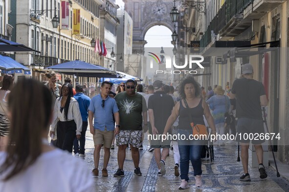 People are seen walking in Da Prata street, in the neighborhood of Baixa, Lisbon. 02 May 2023. 