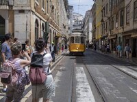A Tram is seen passing through one of the streets in the neighborhood of Baixa, Lisbon. May 02, 2023. (