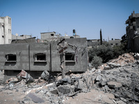 Destruction in several buildings after they were hit by an Israeli airstrike in Beit Lahiya in the northern Gaza Strip on May 13, 2023. Isra...