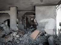 Destruction in several buildings after they were hit by an Israeli airstrike in Beit Lahiya in the northern Gaza Strip on May 13, 2023. Isra...