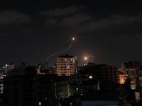 Rockets are fired from Gaza City towards Israel on May 13, 2023. Israeli air strikes battered Gaza again on May 13 in response to rocket fir...