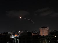 Rockets are fired from Gaza City towards Israel on May 13, 2023. Israeli air strikes battered Gaza again on May 13 in response to rocket fir...