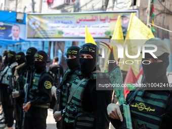 Palestinian militants from Al-Quds Brigades, the military wing of the Islamic Jihad movement, attend a eulogy for Islamic Jihad official Iya...