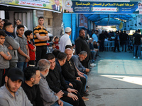 Palestinians attend a eulogy for Islamic Jihad official Iyad al-Hassani, who was killed in an Israeli air strike on May 13, following a ceas...