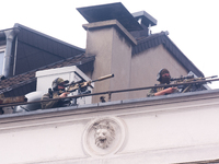 

A general view of special forces is seen on the rooftops of several buildings in front of the town hall as Ukraine President Volodymyr Zel...