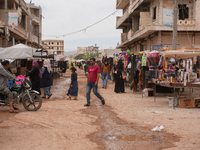 The popular market in the center of Jandaris city resumes its previous activity after the removal of tons of debris from the destroyed build...