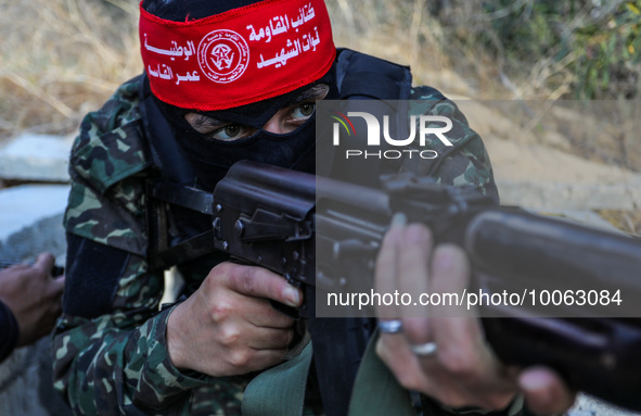 Fighters from the Democratic Front for the Liberation of Palestine (DFLP) take part in training drills in the southern Gaza Strip, on May 19...
