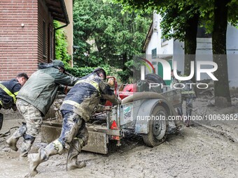 Fire brigade at work cleaning up the mud. Bologna Mountain, 20 May 2023. Bologna's mountains are still ravaged by mud, while roads are still...