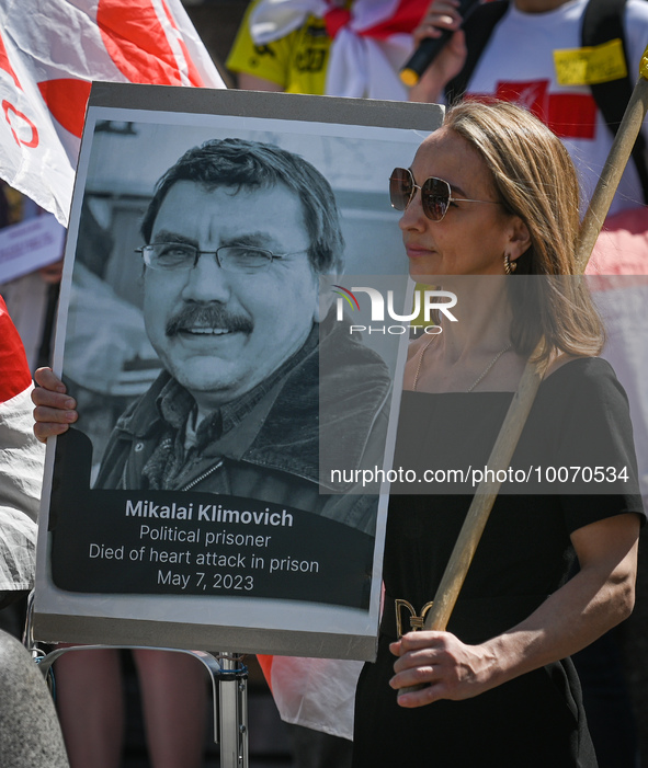 KRAKOW, POLAND - MAY 21, 2023:
Unified in solidarity, members of the local Belarusian and Ukrainian diaspora, hold pictures of detained peop...