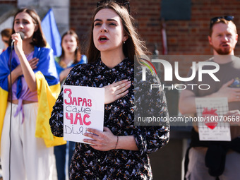 Protesters hold banners during a demonstration of solidarity with Ukrainians in Russian captivity. Krakow, Poland on May 21, 2023. Since the...