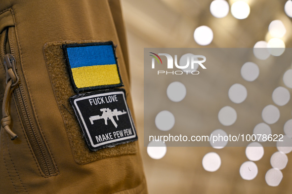 LVIV, UKRAINE - MAY 22, 2023 - Chevrons on the sleeve of a participant of a meeting of FPV drone manufacturers with representatives of local...