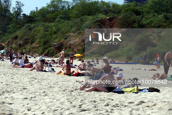 ODESA, UKRAINE - MAY 21, 2023 - Holidaymakers recreate on the ''Dog Beach'', Odesa, southern Ukraine. NO USE RUSSIA. NO USE BELARUS.