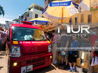 

A fire services vehicle is passing through the tight streets of Cheung Chau in Hong Kong, China, on May 26th, 2023, as the Bun Festival ta...
