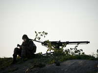 An Estonian soldier is seen with a heavy machine gun near Tapa, Estonia on 19 May, 2023. Estonia is hosting the Spring Storm NATO exercises...
