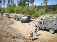 Soldiers and vehicles are seen during an exercise near Tapa, Estonia on 20 May, 2023. Estonia is hosting the Spring Storm NATO exercises inv...