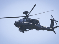 An Apache helicopter is seen flying over an army base in Tapa, Estonia on 20 May, 2023. Estonia is hosting the Spring Storm NATO exercises i...