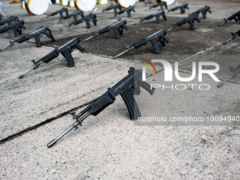 Several rifles are seen during the funeral honors to police officer Andres Idarraga Orozco killed in a guerrilla bomb attack in Tibu, Norte...