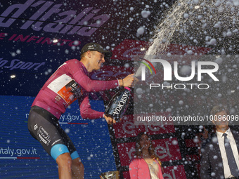Jonathan Milan of Italy and Team Bahrain - Victorious - Purple Points Jersey celebrates at podium during the 106th Giro d'Italia 2023, Stage...