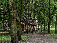 ZAPORIZHZHIA REGION, UKRAINE - MAY 28, 2023 - The military personnel of the 128th Mountain Assault Brigade join the 30th Chestnut Run, Zapor...