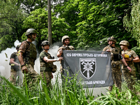 ZAPORIZHZHIA REGION, UKRAINE - MAY 28, 2023 - Servicemen of the 128th Mountain Assault Brigade who took part in the 30th Chestnut Run are pi...
