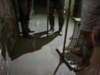 A general view of volunteers at work and the flood damage in Emilia Romagna on May 30, 2023 in Faenza, Italy (