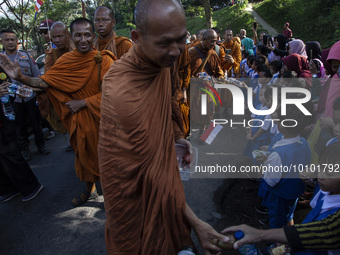 Buddhist monks take a religious journey in Bedono, Central Java, on May 30 2023. A total of 32 Buddhist monks from Thailand, Malaysia and In...