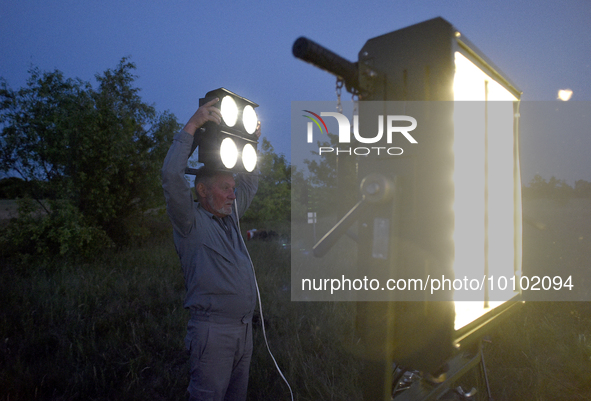 KYIV REGION, UKRAINE - MAY 29, 2023 - The work of various types of searchlights intended for air defence forces for the timely detection of...
