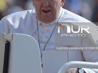 Pope Francis arrives to lead his weekly general audience at St. Peter's square in the Vatican on May 31, 2023.  (