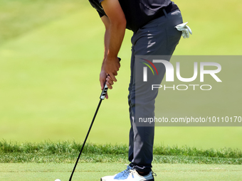 Mark Hubbard of Denver, Colorado putts on the 18th green during the first round of the The Memorial Tournament presented by Workday at Muirf...