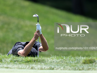 Mark Hubbard reacts to his shot on the 17th green during the first round of the 48th Memorial Tournament presented by Workday at Muirfield V...