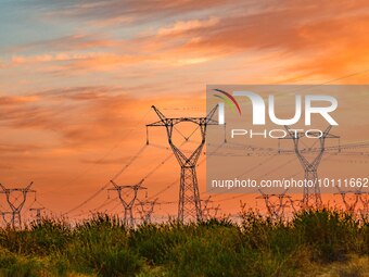 ORDOS, CHINA - JUNE 1, 2023 - An ultra-high voltage direct current (UHVDC) power transmission project is seen on grassland in Ordos city, In...