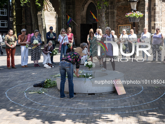 Attendees at the witch commemoration in Utrecht, Netherlands, on June 3, 2023. White flowers are today placed in places where witches used t...