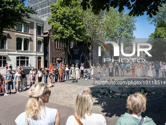 Attendees at the witch commemoration in Utrecht. , Netherlands, on June 3, 2023. White flowers are today placed in places where witches used...