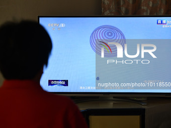 FUYANG, CHINA - JUNE 4, 2023 - People watch a live TV broadcast of the Shenzhou 15 Spacecraft Crew Returned to Earth in Fuyang City, Anhui P...