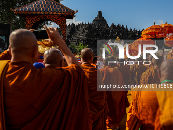 MAGELANG, CENTRAL JAVA, INDONESIA - JUNE 4: Buddhist monks attend as they pray at the Borobudur temple as a part of celebrations for Vesak D...