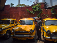 A taxi driver drinking water on a taxi stand during a Heatwave in Kolkata, India on 04 June 2023. This is the third heat wave this summer in...