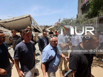 Sven Kuhn von Burgsdorff, European Union Representative to the West Bank and Gaza, is given a tour of the remains of the residential buildin...