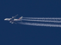 Emirates Airbus A380 double decker passenger aircraft as seen flying in the blue sky over Germany in Europe, the is route EK3 from Dubai DXB...