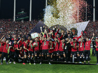 USM Alger players celebrate with the trophy, during the 2022/2023 CAF Football Confederation Cup Final between USM Alger of Algeria and youn...