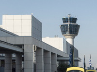 The Control Tower of Athens Airport.
People who travel spotted inside the departure hall early morning in the check-in area and departures a...