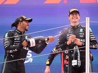 Lewis Hamilton of Mercedes-AMG Petronas F1 Team  and George Russel of Mercedes-AMG Petronas celebrate on podium during race of Spanish GP, 8...