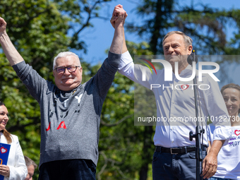 Donald Tusk (R) leader of the opposition party Civic Platform , Lech Walesa during an anti-government march in Warsaw called on the annivers...