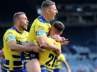 Warrington Wolves' Connor Wrench celebrates after scoring a try during the BetFred Super League match between Hull Football Club and Warring...