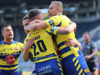 Warrington Wolves' Connor Wrench celebrates after scoring a try during the BetFred Super League match between Hull Football Club and Warring...