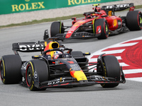 Max Verstappen, Red Bull/Honda RBPT 78, and Csarlos Sainz, Ferrari,  during he Formula 1 AWS Spanish Grand Prix race, held at the Barcelona...