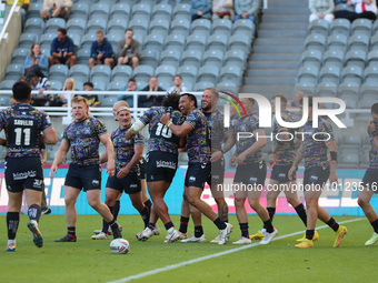 Hull FC's  Josh Griffin celebrates with his team mates after scoring his 2nd try during the BetFred Super League match between Hull Football...