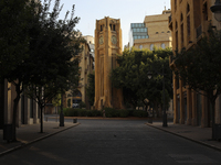 A soldier walks past the Clock Tower in the Etoile Square in the closed protected area of Down Town in Beirut. Lebanon, Sunday, June 4th, 20...